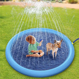 Small dog and Child enjoying splash sprinkler pad