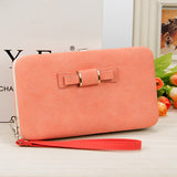 Factory spot low price wholesale new Korean version of women's wallet in the long money bag butterfly knot lunch box woman bag tide